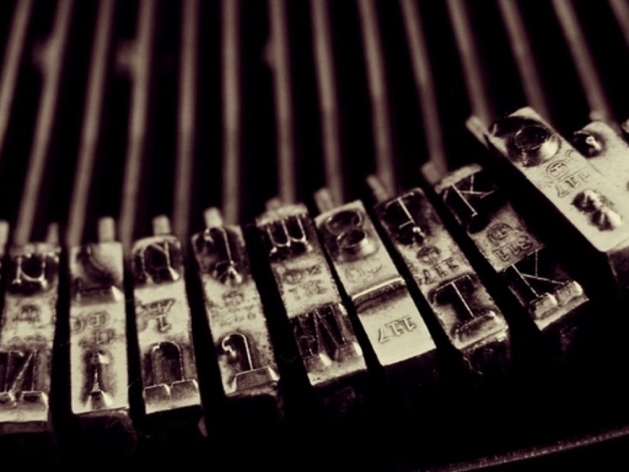 Type specimens laid out on a desk